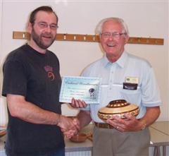 The monthly Highly commended Frank Hayward received his certificate from Mark Hancock